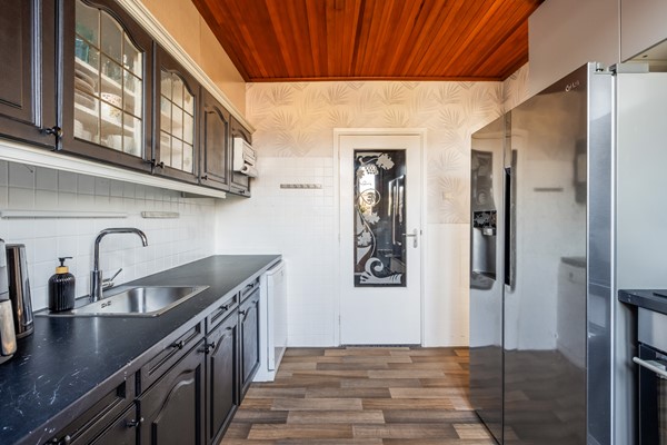 Foto - Te koop: Tussenwoning in Fijnaart